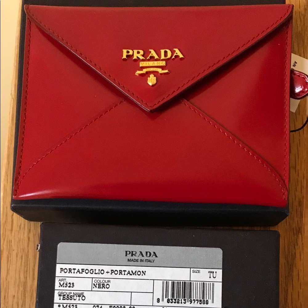$220 ON DEPOP—-NWT Prada Portfolio Wallet.